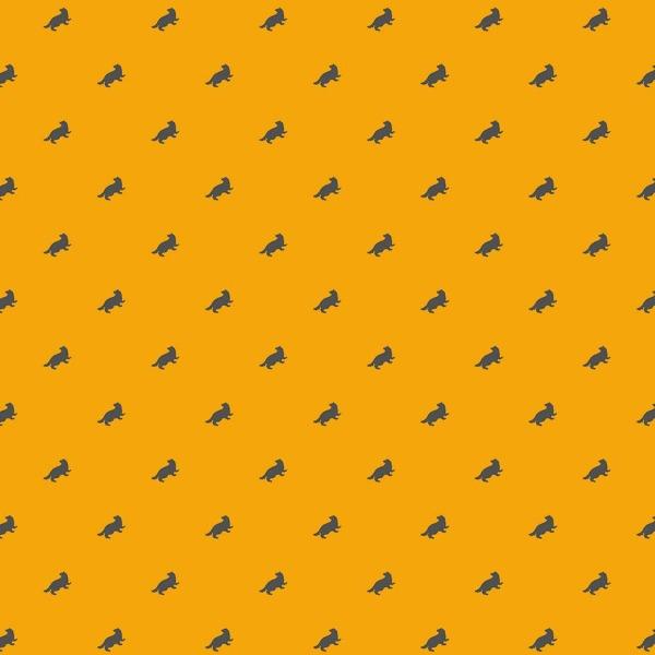 Harry Potter scrapbook paper featuring Hufflepuff mascot pattern on yellow background.