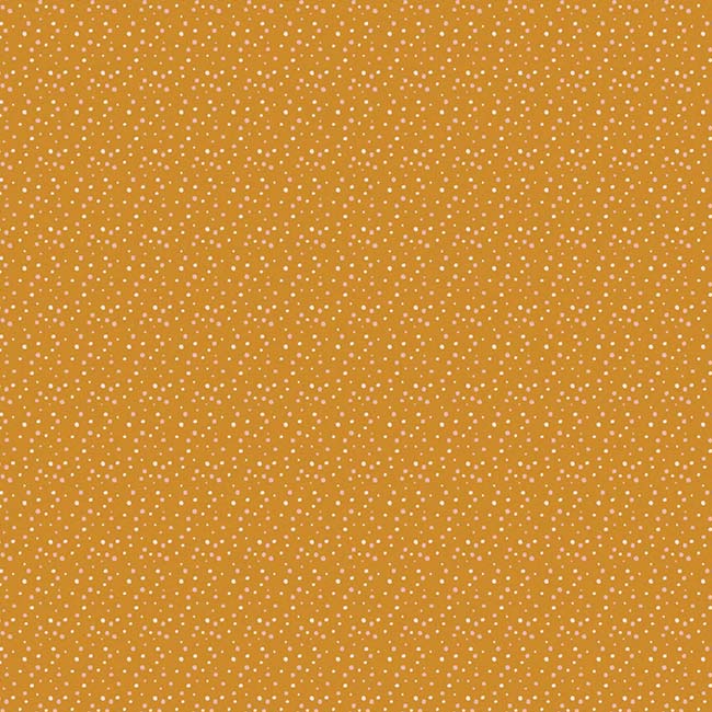 scrapbook paper featuring an orange dotted pattern.