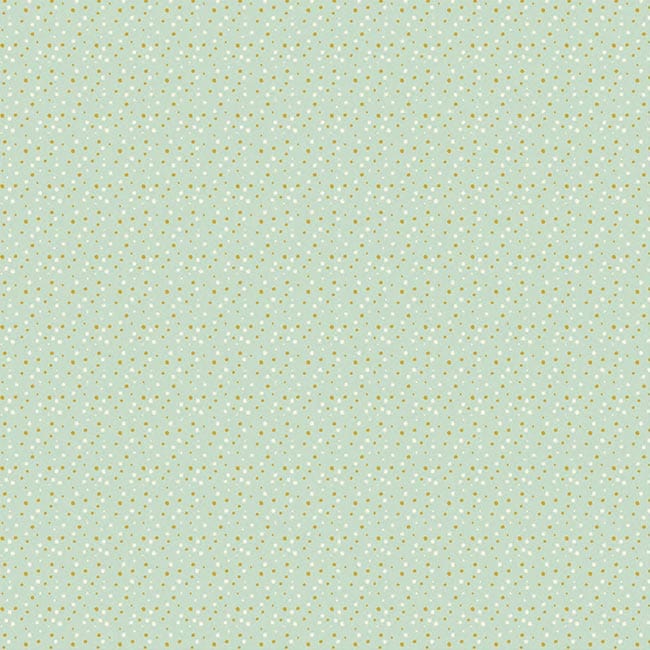 scrapbook paper featuring a pattern of green dots.