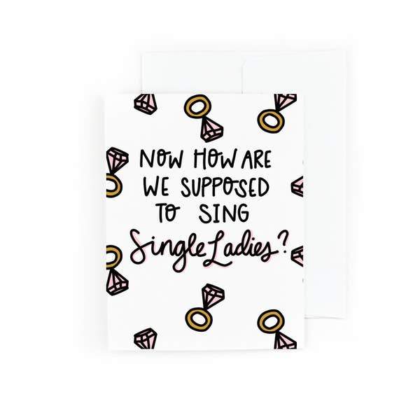 note card featuring illustrated engagement rings with "Single Ladies" text in black script, shown on white background.