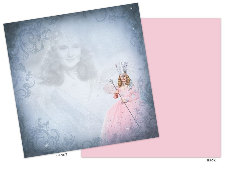 PSET-0007E - Scrapbook Paper Set - Wizard of Oz - Two-sided scrapbook paper set showing front design with Good Witch in pink gown and crown, and solid pink back