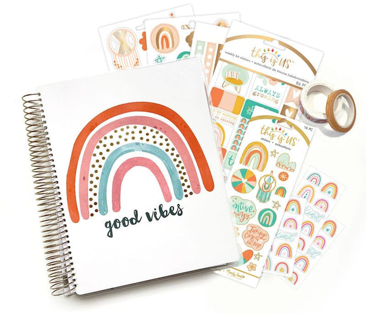 SET-0138E - Boho Rainbow Planner Bundle - Spiral-bound planner with rainbow design, sticker sheets, and washi tape in warm earth tones featuring "good vibes" text