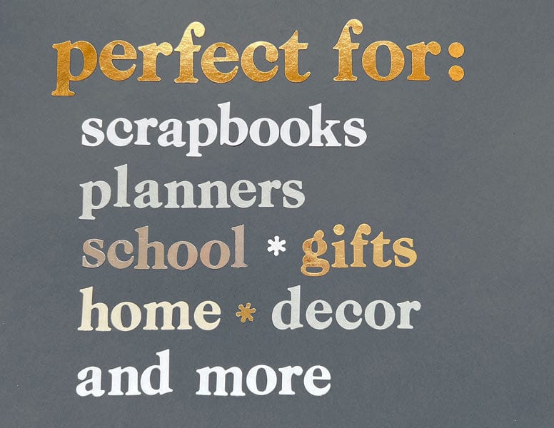 STBK-1001E - Alphabet Stickers - Alphabooks Colorways Serifs - Gold and white alphabet stickers displayed on gray background with text listing uses like scrapbooks, planners, and gifts