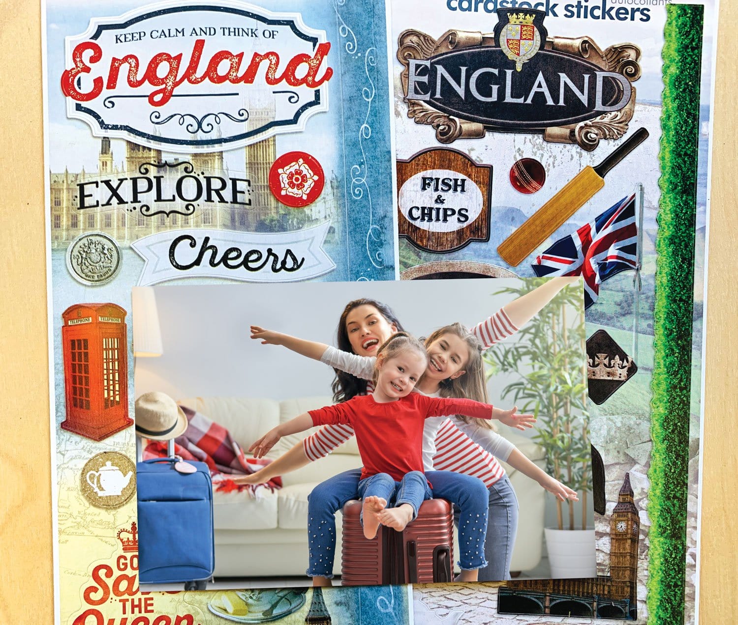 STCX-4027E - Scrapbook Stickers - London Value Pack - Decorative England-themed stickers featuring Big Ben, fish and chips, red telephone booths, and Union Jack flags arranged on a travel-inspired layout