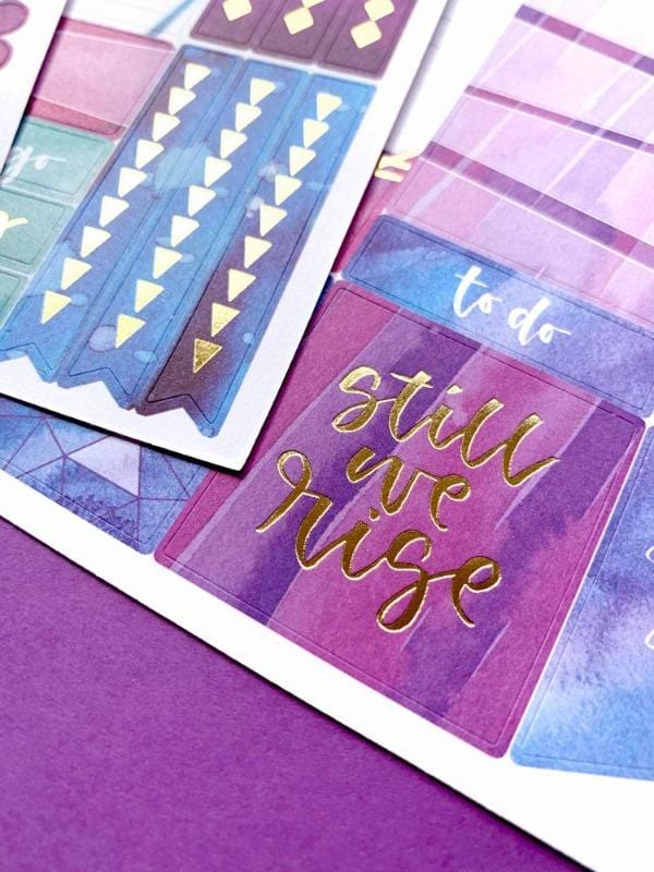 empowerment weekly kit planner stickers shown on purple background