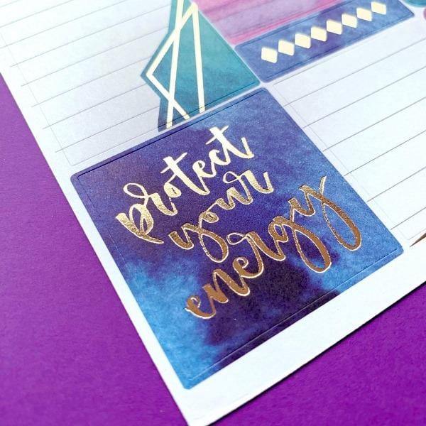 empowerment weekly kit planner stickers shown on purple background