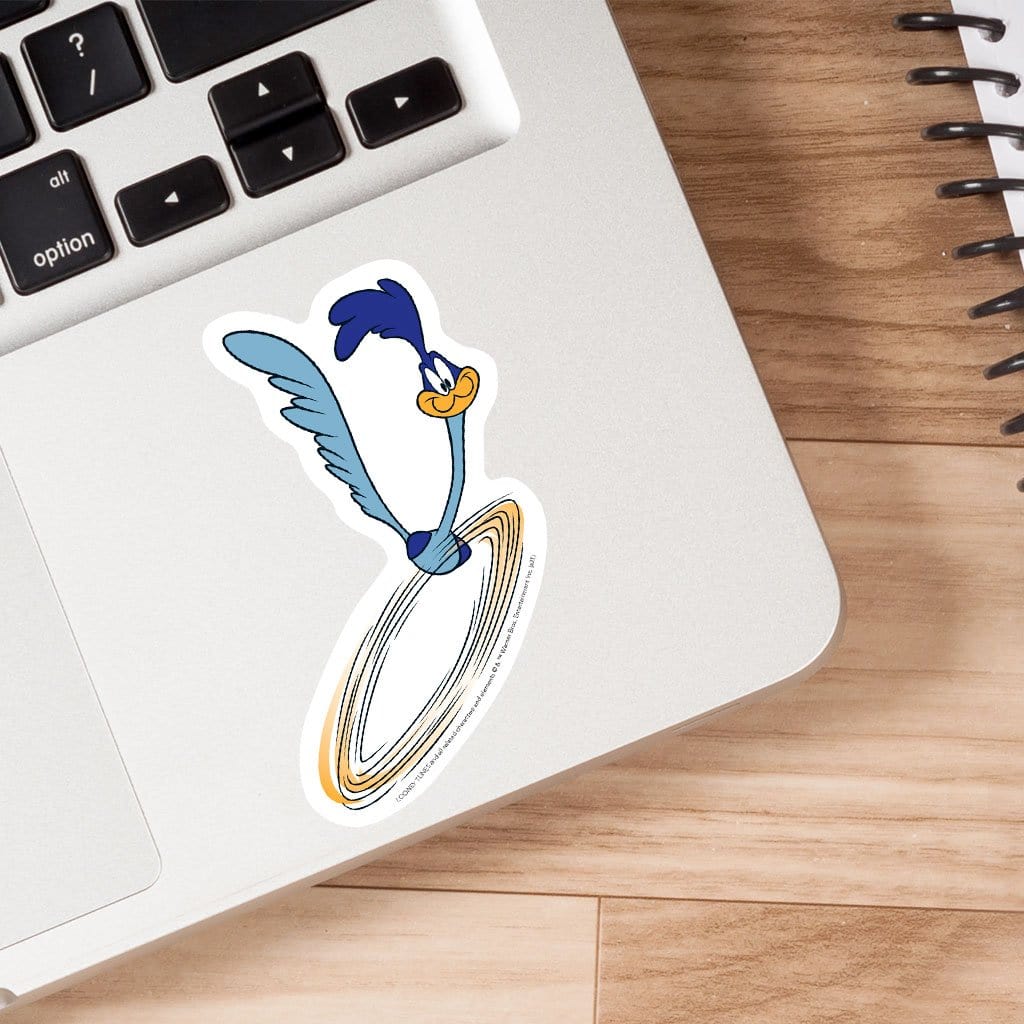 Road Runner vinyl laptop sticker shown adhered to a laptop.