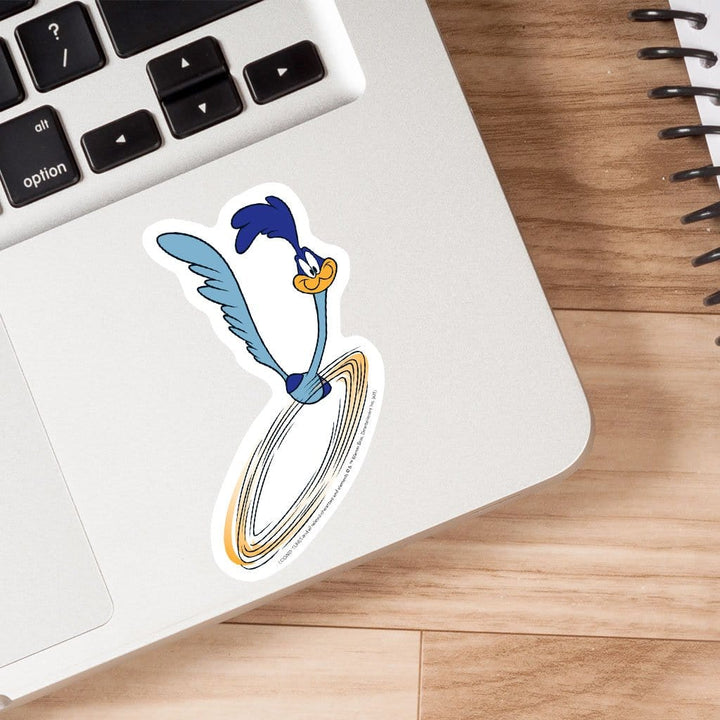 Road Runner vinyl laptop sticker shown adhered to a laptop.